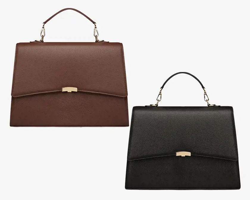 En brun och svart handväska. 